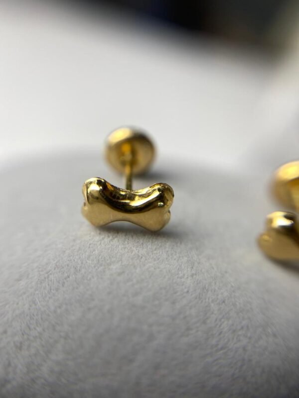 TOPO HUESO ORO